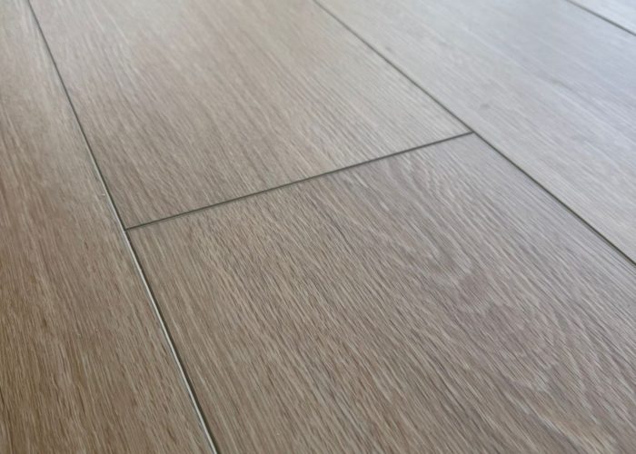 About Us Wide plank vinyl flooring with realistic timber texture